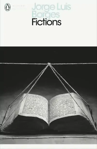 The cover of the Penguin edition of Fictions, by Jorge Luis Borges. The cover features a black and white photo of a very old manuscript, open on its back to the central pages.