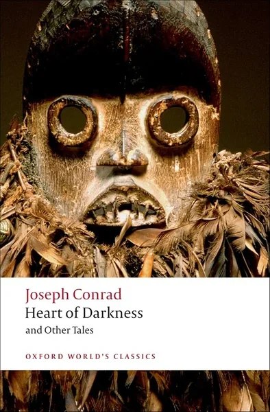 Cover features the image of an African tribal mask.