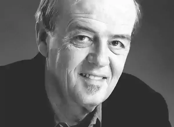 Black and white photo portrait of James Tate