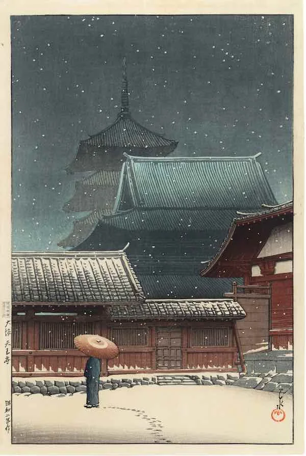 This is a woodblock print depicting a Japanese temple from the Showa period. There is a gentle snow falling and in front of the temple a person with an umbrella walks away from us leaving footprints in the snow.